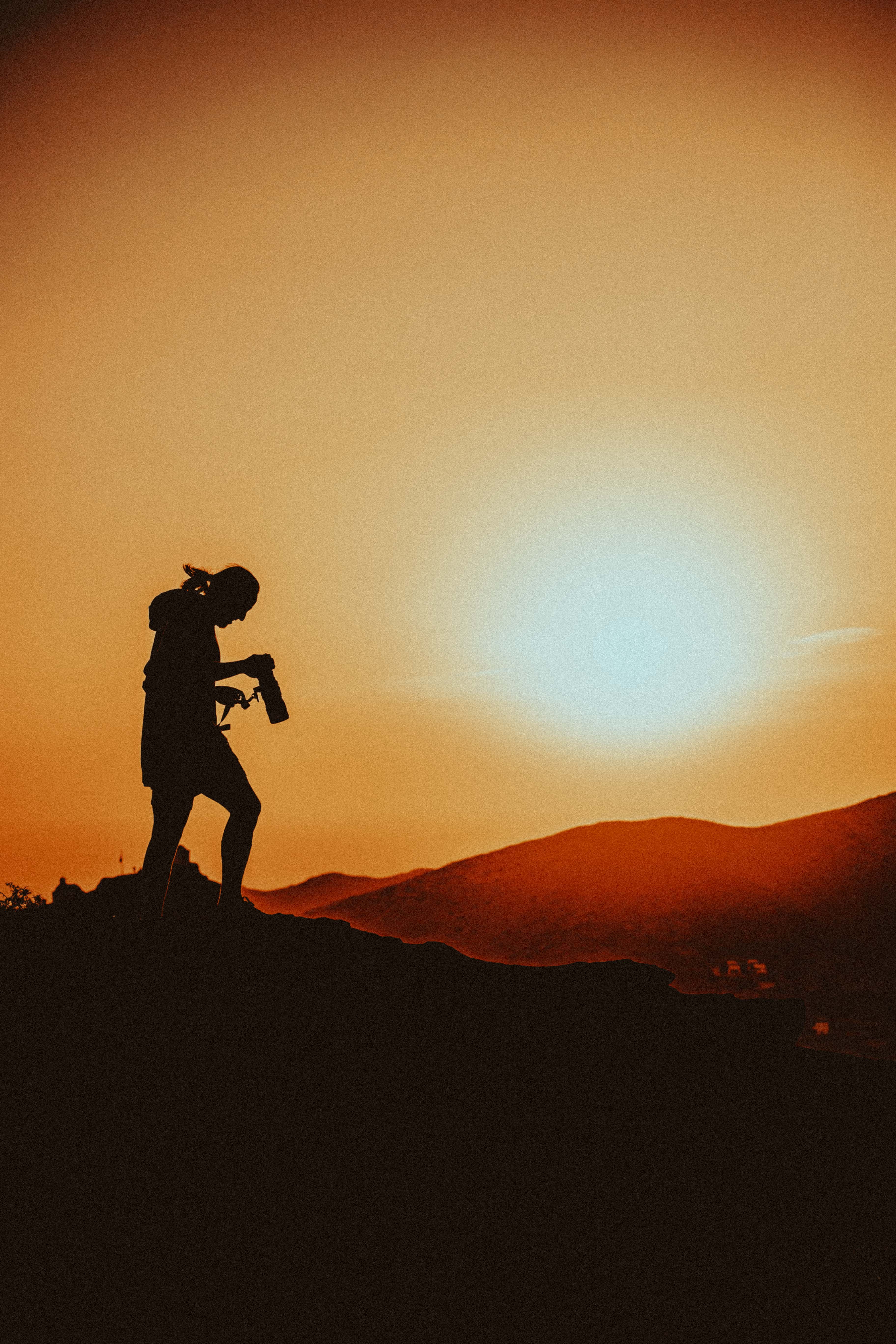 Photographer at sunset